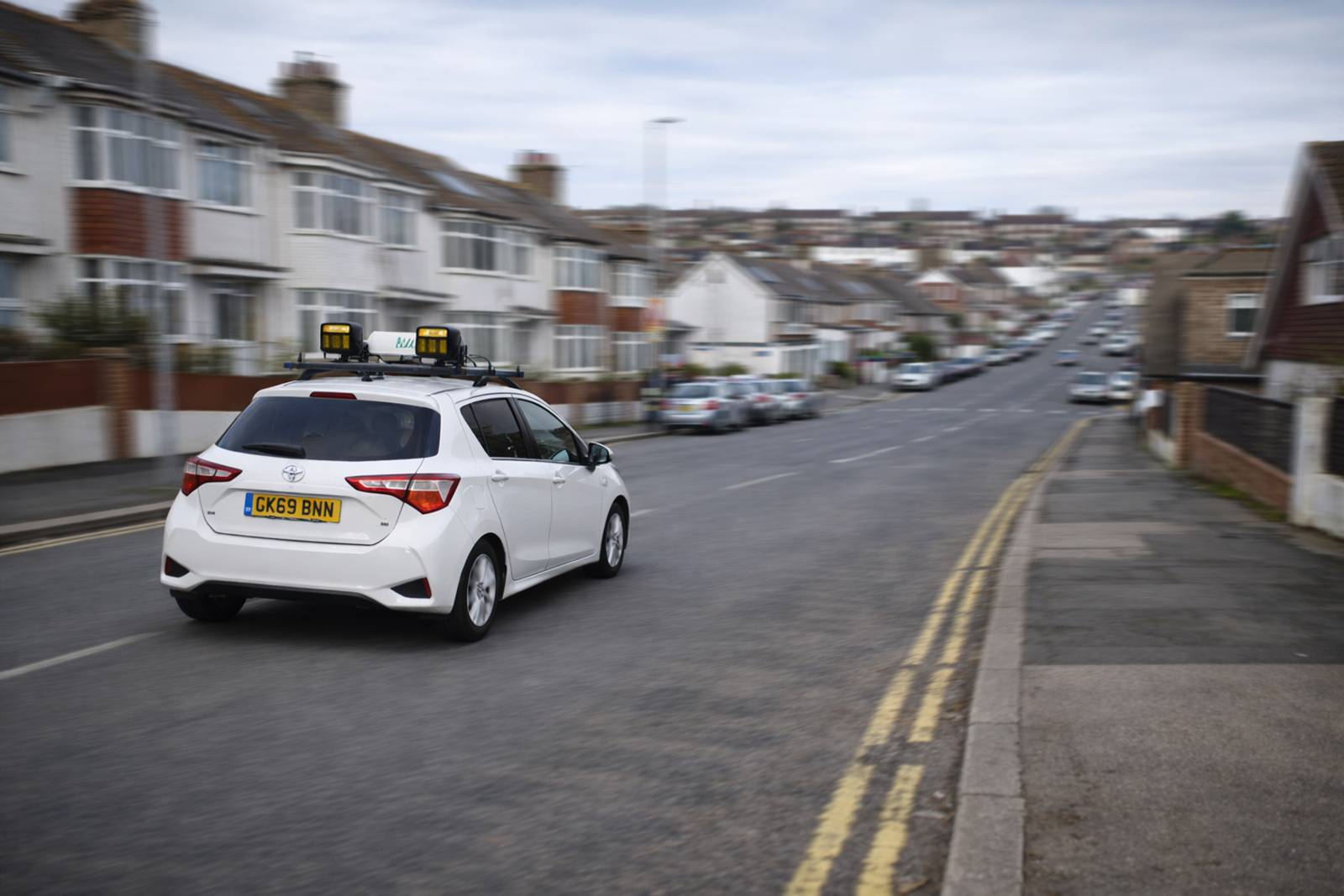 A photograph of a Brighton & Hove council vehicle with ANPR cameras mounted on it, driving in Hollingdean.
